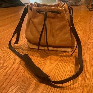 Banana Republic leather tan and black drawstring bucket bag